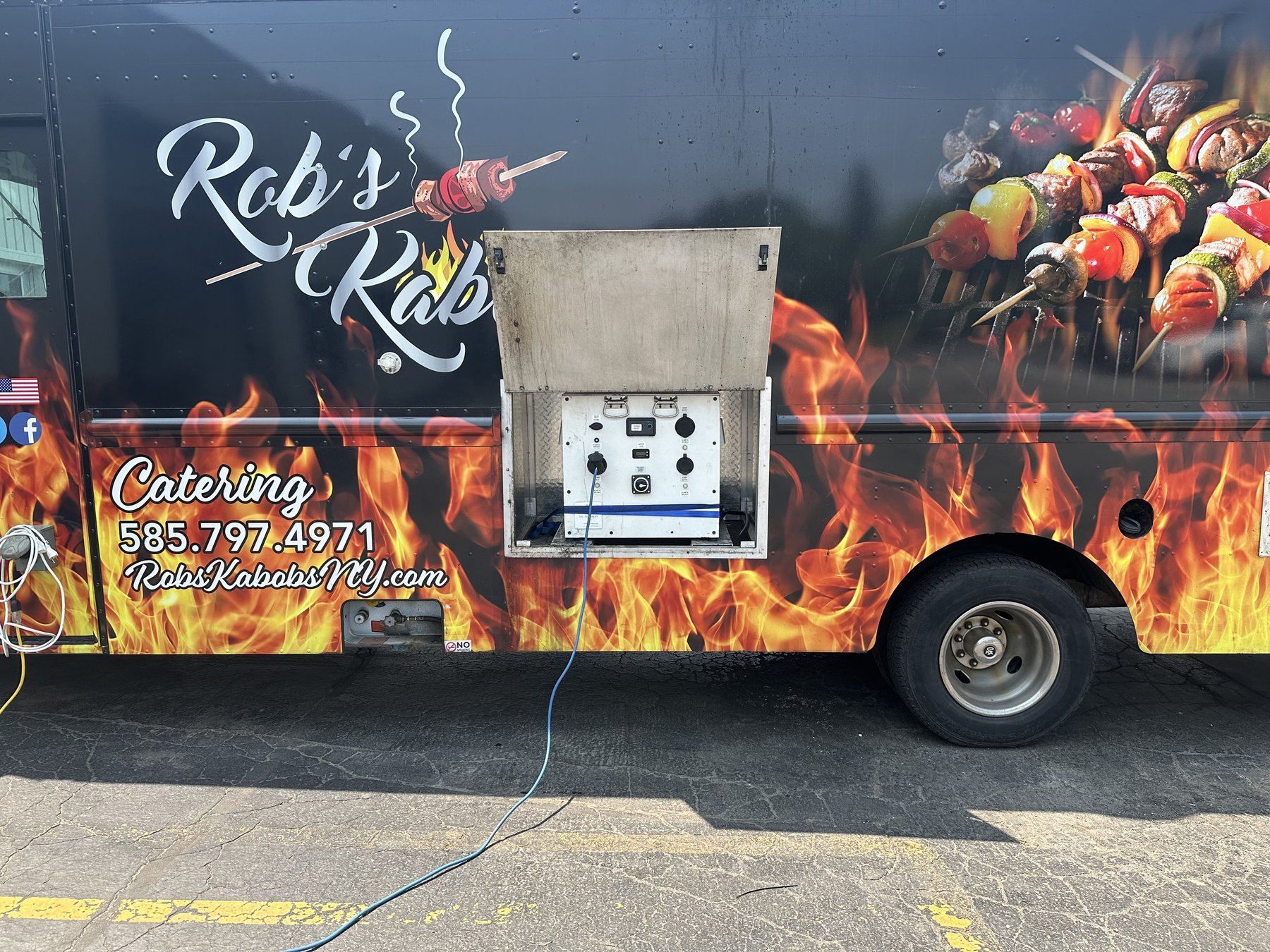 Rob's Kabobs food truck in Rochester, NY with a PowerBox 10K mounted in the exterior electrical compartment